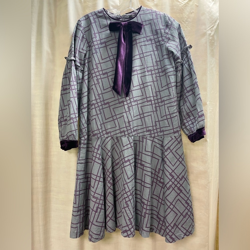 NWOT kidichic long sleeve dress with a velvet bow and trimmings